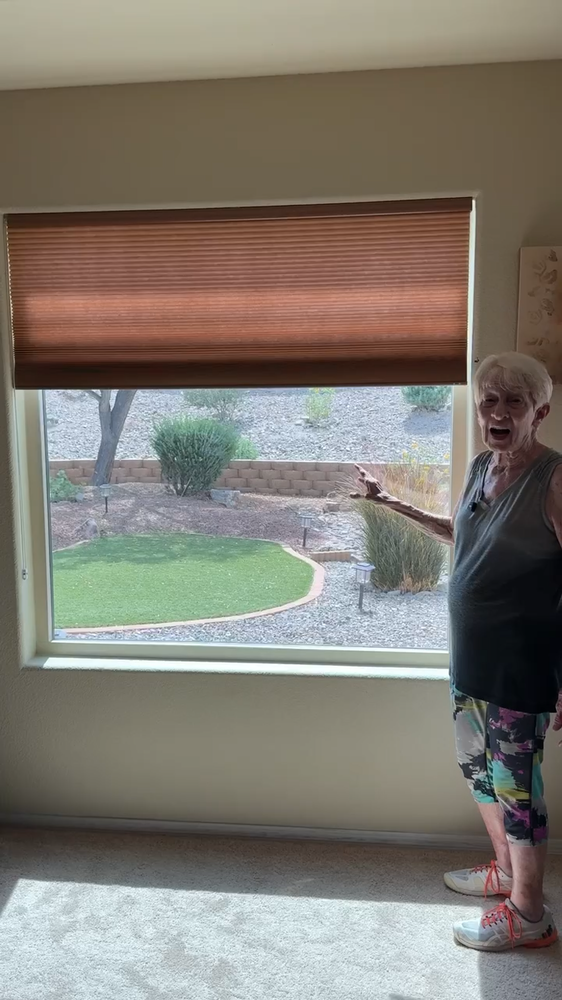 Lake Havasu homeowner beside her large window